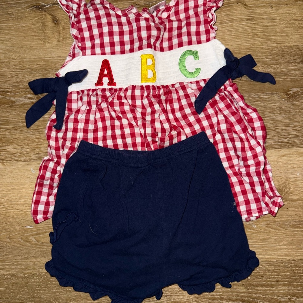 Red Gingham ABC Smocked Top with Navy Ruffle Shorts